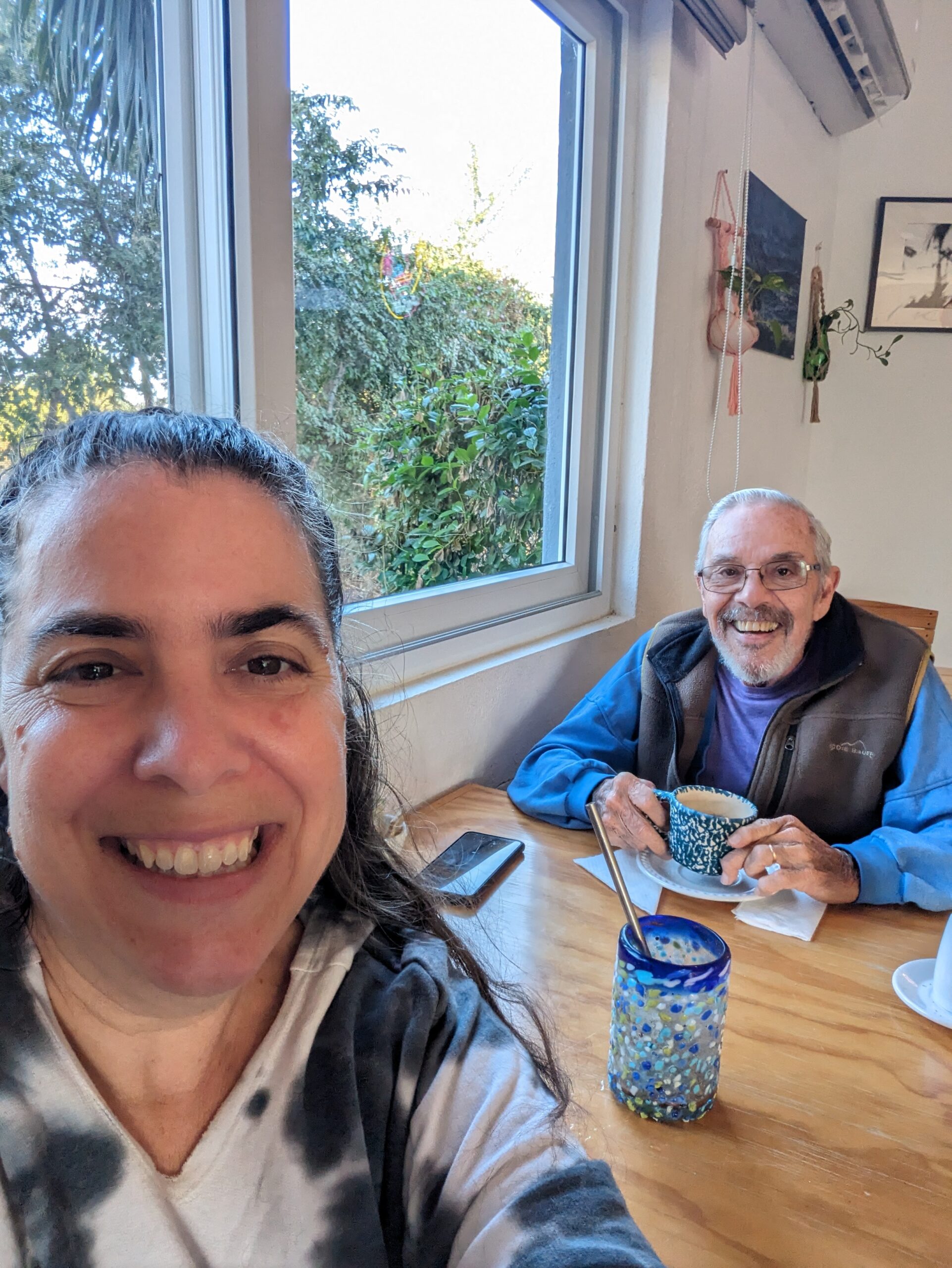 Julie with her Dad in the coffee shop.