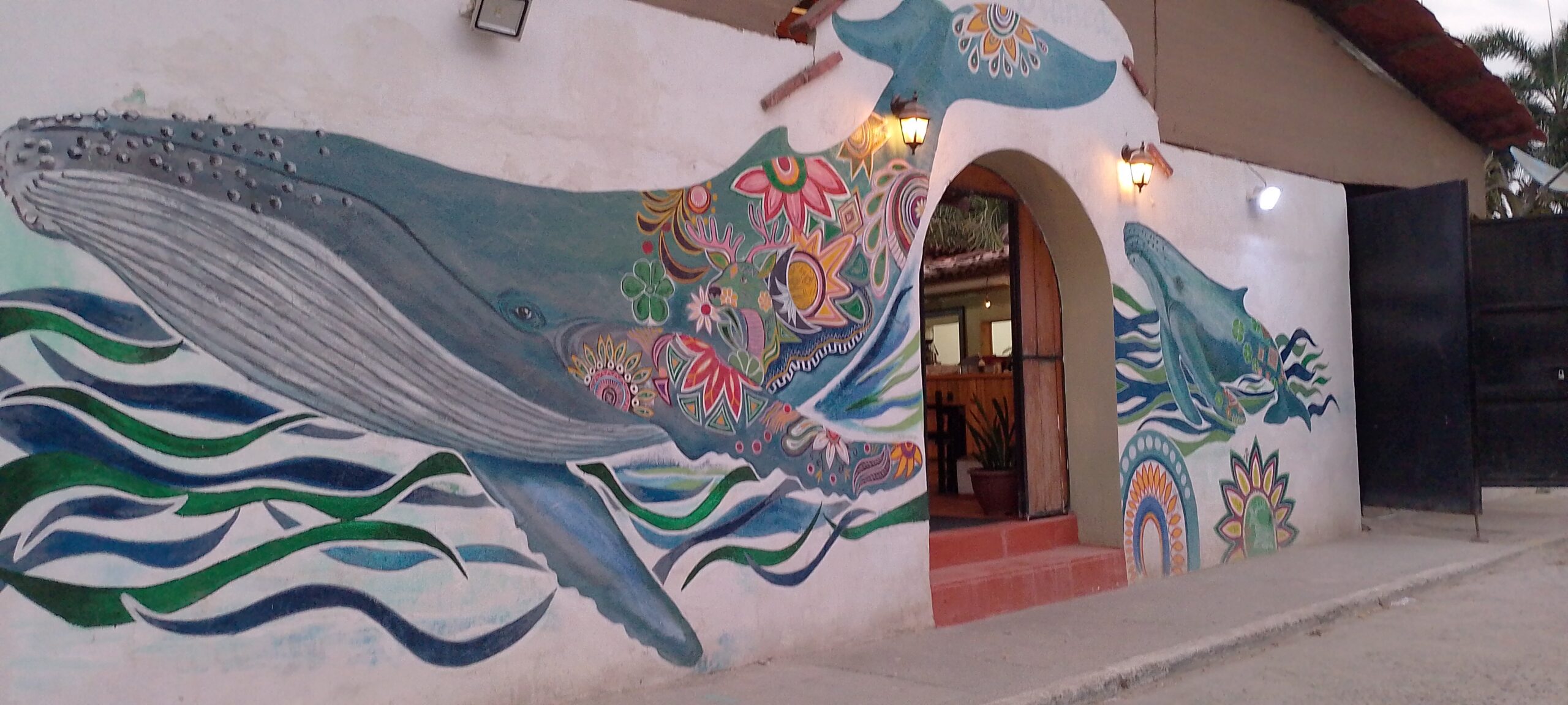 Whale mural at "La Ballena Blanca" in La Cruz.