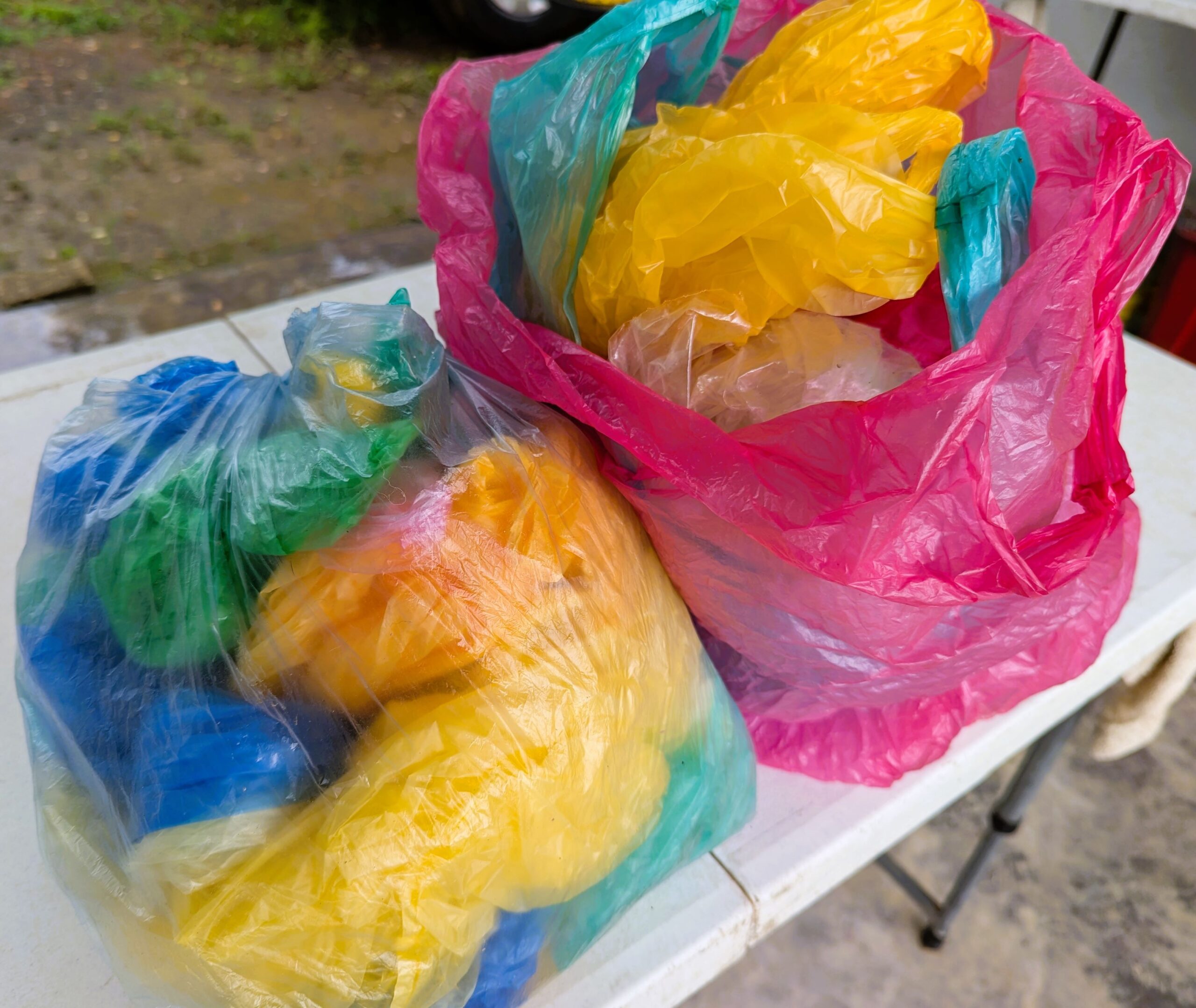 Plastic grocery bags of many colors.